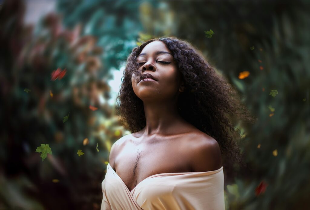 a woman with her eyes closed looking peaceful