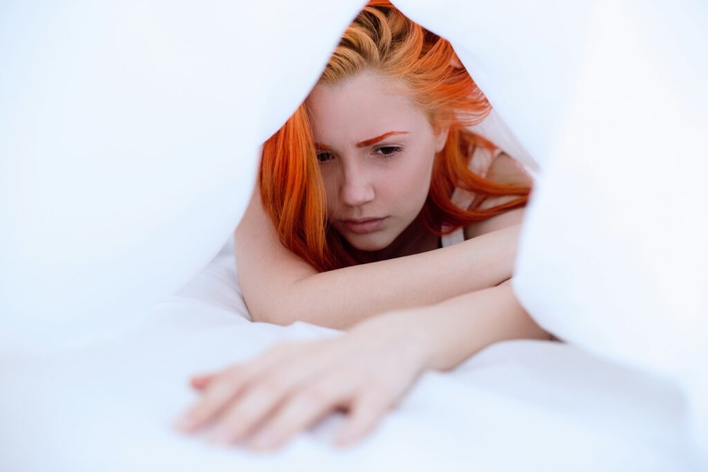 woman struggling with sleep anxiety